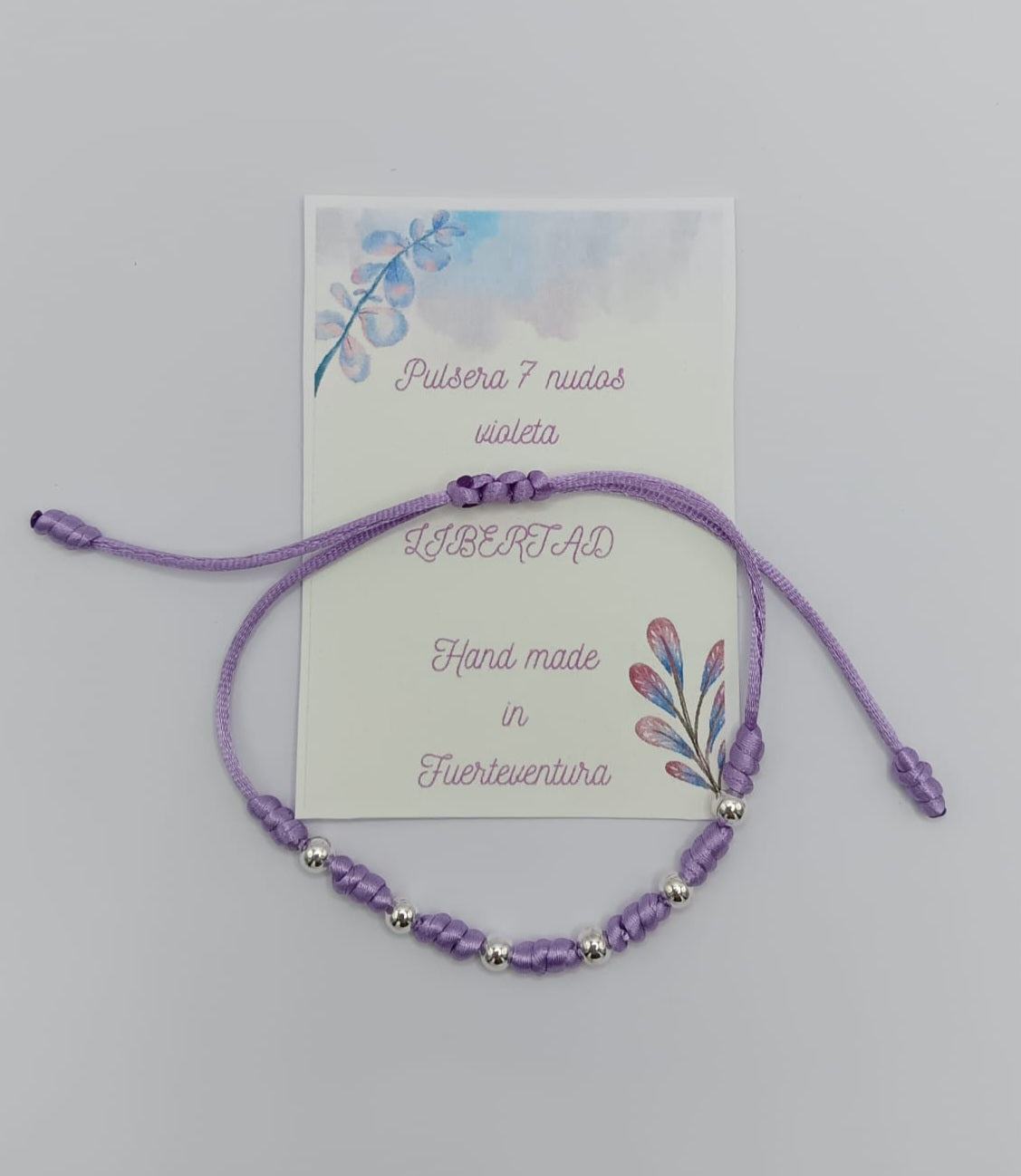 Pulsera hilo siete nudos lila