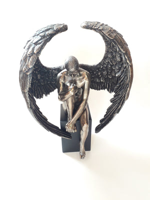 Figura bronce hombre alas 27cm